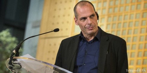epa04599892 Greek newly appointed Finance Minister Yanis Varoufakis listens to his French counterpart Michel Sapin (not pictured) during a press conference after a meeting at the French Ministry of Economy and Finance of Becy in Paris, France, 01 February 2015. Greece's finance minister kicked off a European roadshow in Paris as the country's newly elected prime minister showed willingness to negotiate on Greek debt repayment. Appointed on the 27 January 2015 following the victory of the Greek far left party Syriza and its leader Tsipras, Varoufakis got a head start on his own tour as he met with before heading on to London on 01 February and Rome on 02 February.  EPA/ETIENNE LAURENT