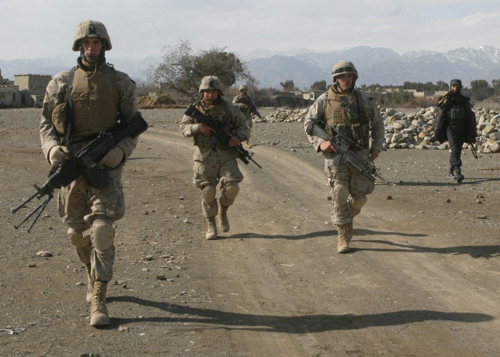 050213-M-4697Y-038 U.S. Marines patrol a road in Khowst Province, Afghanistan, on Feb. 13, 2005. The Marines are assigned to Headquarters and Service Company, 3rd Battalion, 3rd Marines, and are conducting security and stabilization operations in the province.  DoD photo by Cpl. James L. Yarboro, U.S. Marine Corps.  (Released)