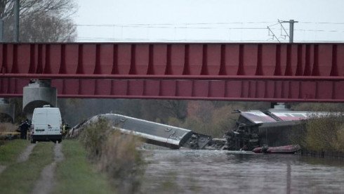 The high-speed test train lies in a canal after derailing in Eckwersheim near Strasbourg