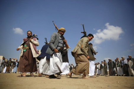 Shiite tribesmen, known as Houthis, perform a traditional dance during a tribal gathering showing support for the Houthi movement in Sanaa, Yemen, Tuesday, Dec. 15, 2015. A tenuous ceasefire is holding in Yemen despite some violations, as U.N.-brokered peace talks between the countrys U.S. and Saudi-backed internationally recognized government and Shiite rebels start in Switzerland. But with both camps positions unchanged and little sign either is ready for compromise, observers are not expecting much.(AP Photo/Hani Mohammed)