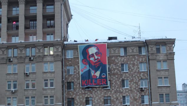 An ‘Obama Killer’ poster hangs on a building across from the U.S. Embassy in Moscow.