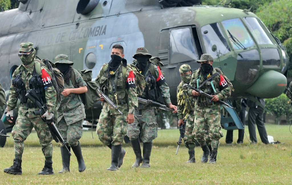 Demobilized members of the ELN (National Liberation Army) arrive in Cali, Colombia on July 16, 2013. Thirty members of the ELN surrendered with their weapons. AFP PHOTO/STR        (Photo credit should read STR/AFP/Getty Images)