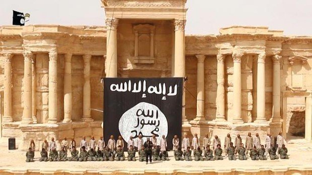 Islamic State militants executing Syrian soldiers on the podium of the Roman amphitheater in the Syrian ancient city of Palmyra. The group has taken over the city in May. Since then they've destroyed several monuments and ancient temples. 