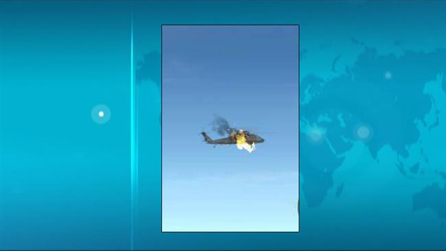The photo, posted on Facebook by Kabul-based Watan Press paper, reportedly shows a targeted helicopter in Helmand Province. 