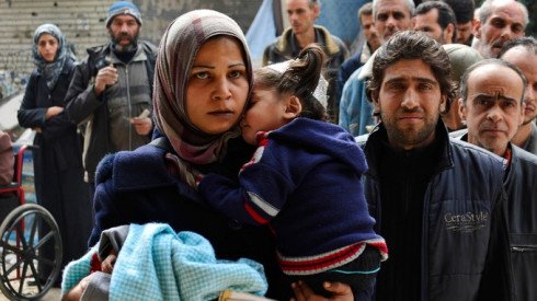 Palestinian refugees in a camp in the Yarmouk camp in Damascus are fleeing intense fighting. Reuters/Stringer