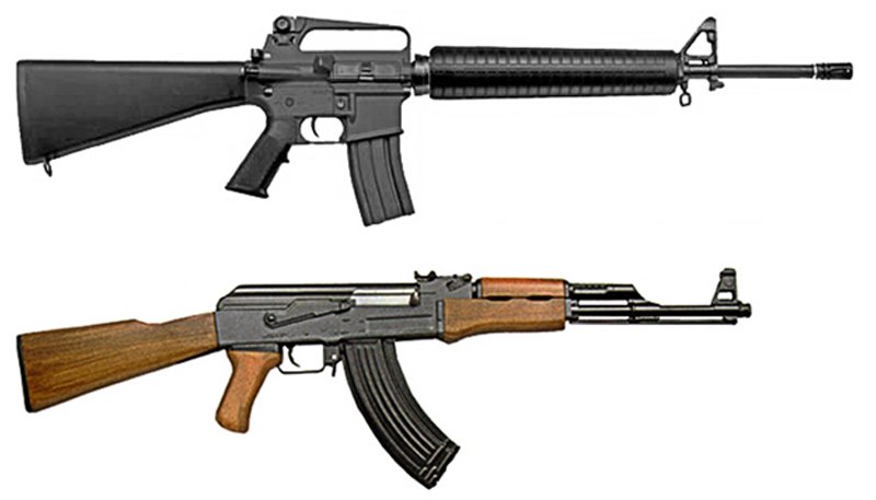 M16A2 and AK47 in profile. Note the simple steel and wood construction of the Russian rifle in comparison to the aluminum alloy and polymer of the American rifle.