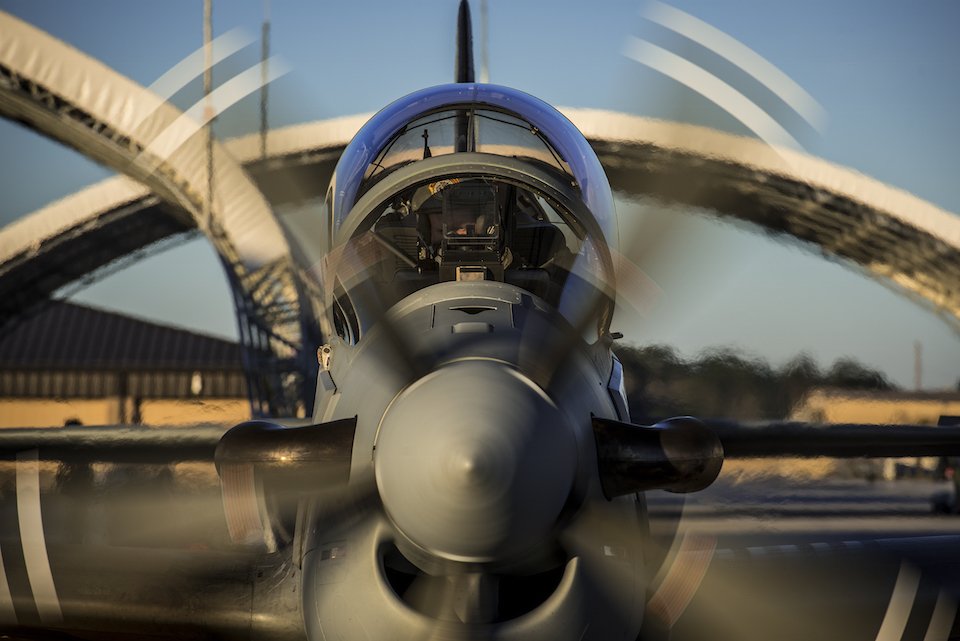 An 81st Fighter Squadron pilot starts the engine in an A-29 Super Tucano Jan. 8, 2015, at Moody Air Force Base, Ga. The A-29 is a turboprop aircraft designed for light air support (LAS) and will be used to support the Afghan LAS training mission at Moody. (U.S. Air Force photo by Senior Airman Ryan Callaghan/Released)