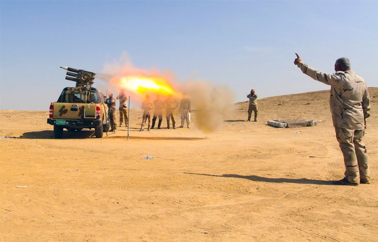 Monday 23 May 2016 Iraq's Popular Mobilization Forces are firing rockets at ISIS positions at Fallujah