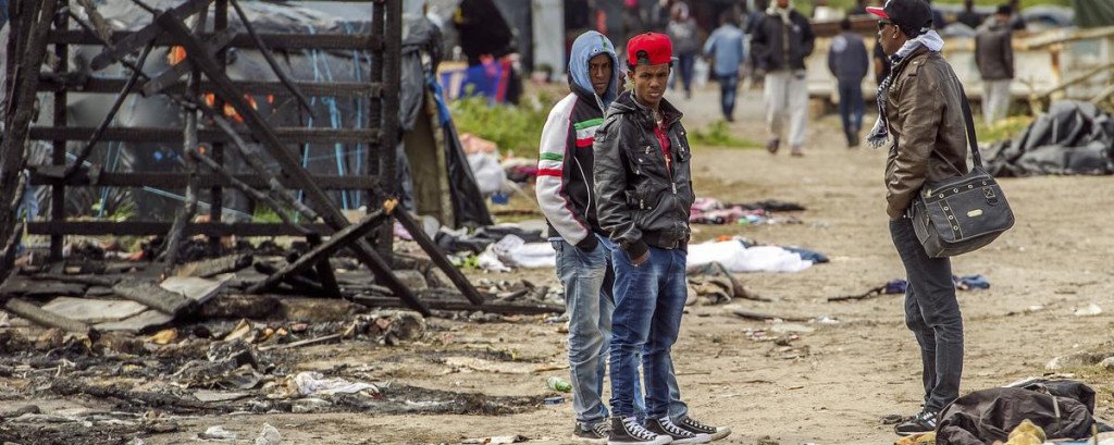 twenty-people-injured-after-fighting-breaks-out-in-calais-migrant-camp-in-france-1433182713