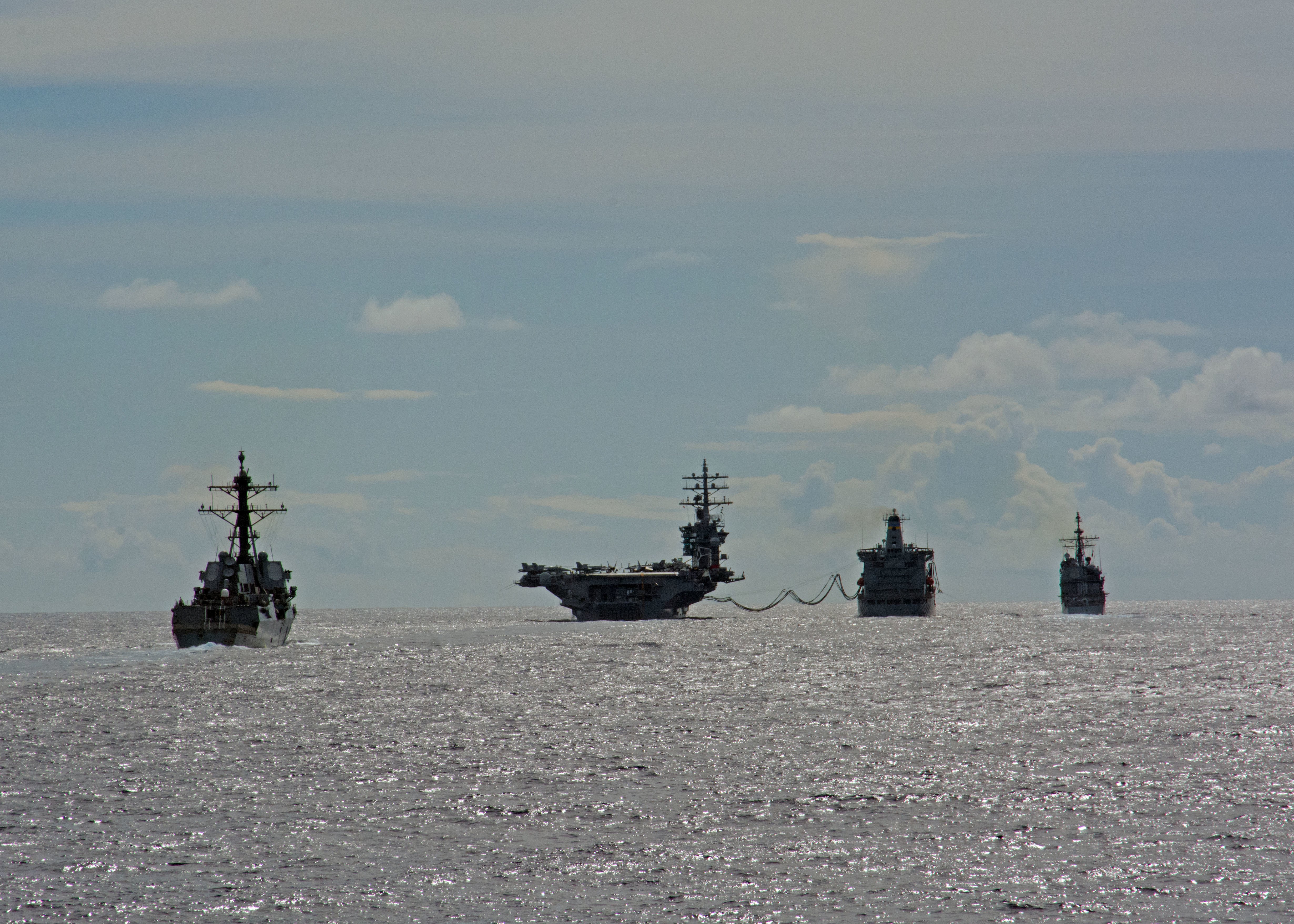 ATLANTIC OCEAN (June 2, 2016) Ships assigned to the Eisenhower Carrier Strike Group (Ike CSG) conduct a replenishment-at-sea with the Military Sealift Command fleet replenishment oiler USNS Big Horn (T-AO 198). Ike CSG is deployed to the U.S. 5th and 6th Fleet areas of responsibility in support of maritime security operations and theater security cooperation efforts. The Ike CSG includes USS Dwight D. Eisenhower (CVN 69) (Ike), Carrier Air Wing (CVW) 3, Destroyer Squadron (DESRON) 26 and ships USS San Jacinto (CG 56), USS Monterey (CG 61), USS Stout (DDG 55), USS Roosevelt (DDG 80), USS Nitze (DDG 94) and USS Mason (DDG 87). (U.S. Navy photo by Seaman Janweb B. Lagazo/Released)