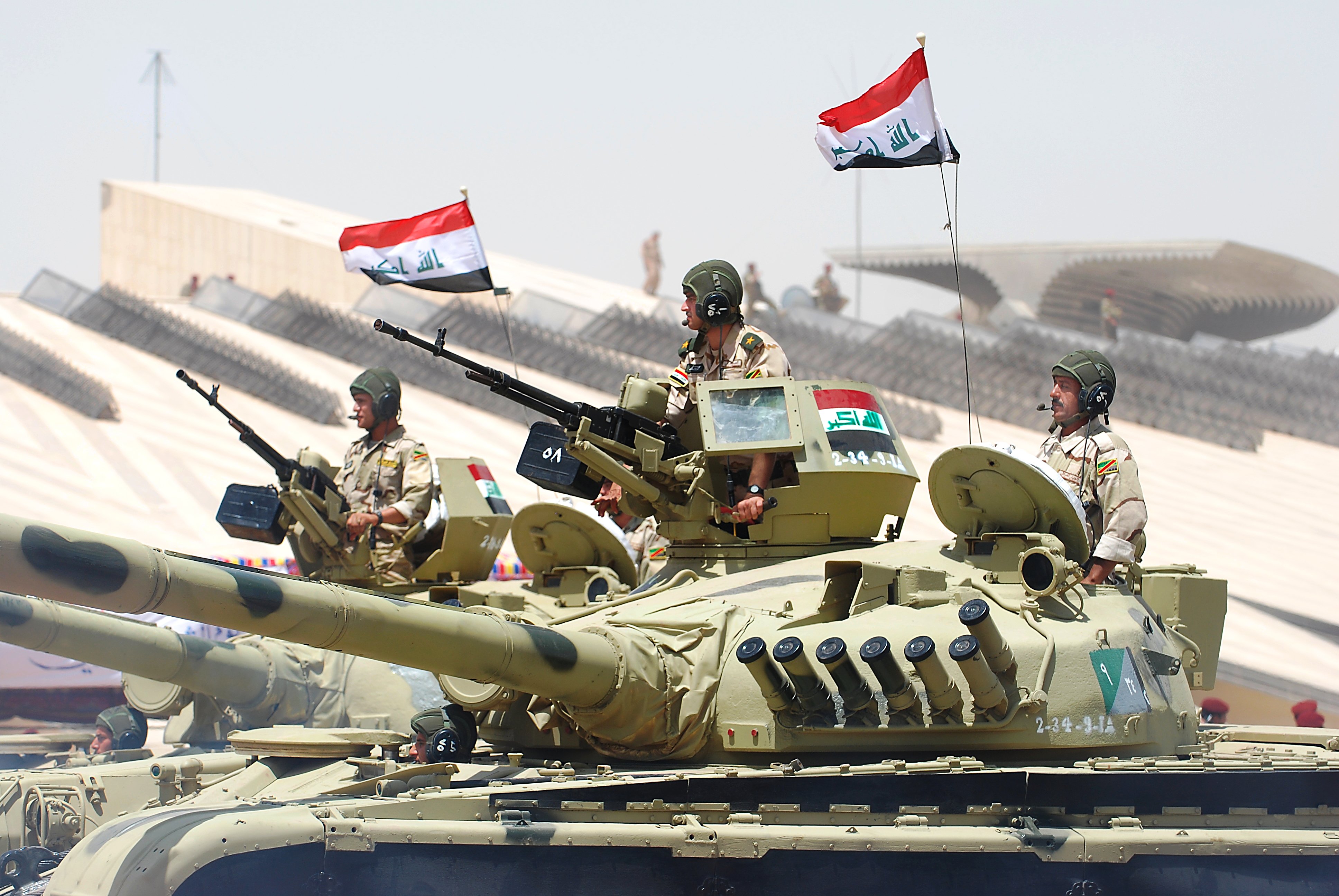 Iraqi T-72s pass in review in Baghdad, June 30, 2009.