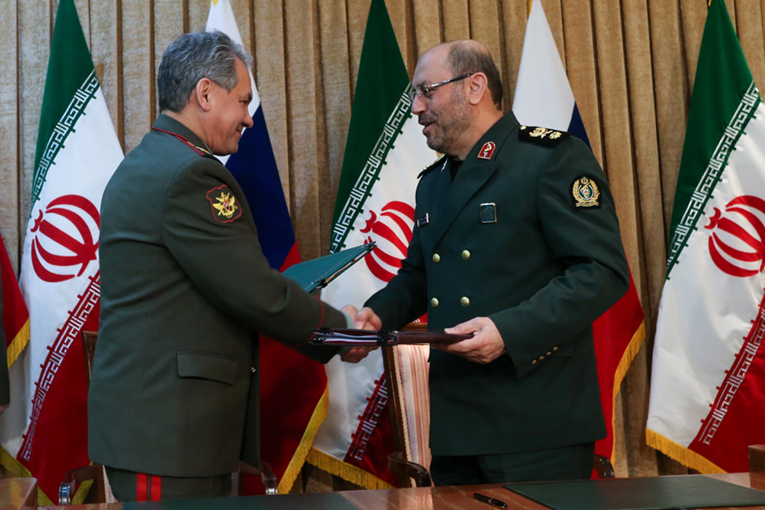 Jan. 20, 2015 Russia's Defense Minister Sergei Shoigu, left, and Iran's Defense Minister Hossein Dehghan  (AP Photo/ Vadim Savitsky, Russian Defense Ministry Press Service)