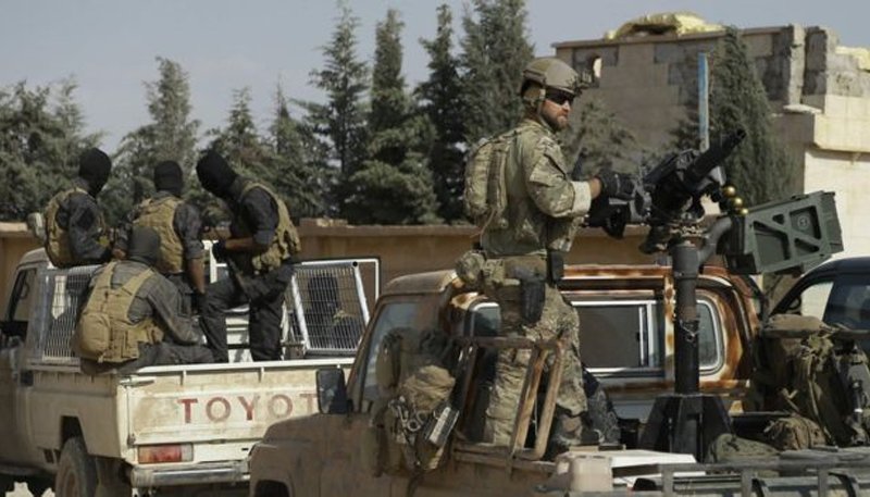 U.S. special operators traveling in a convoy of trucks with SDF militants. Is it so hard to understand from this picture why Russia doubts the affiliation of these black-clad, masked men? Are they rebels or terrorists? At this point in the conflict, is there really any distinction?