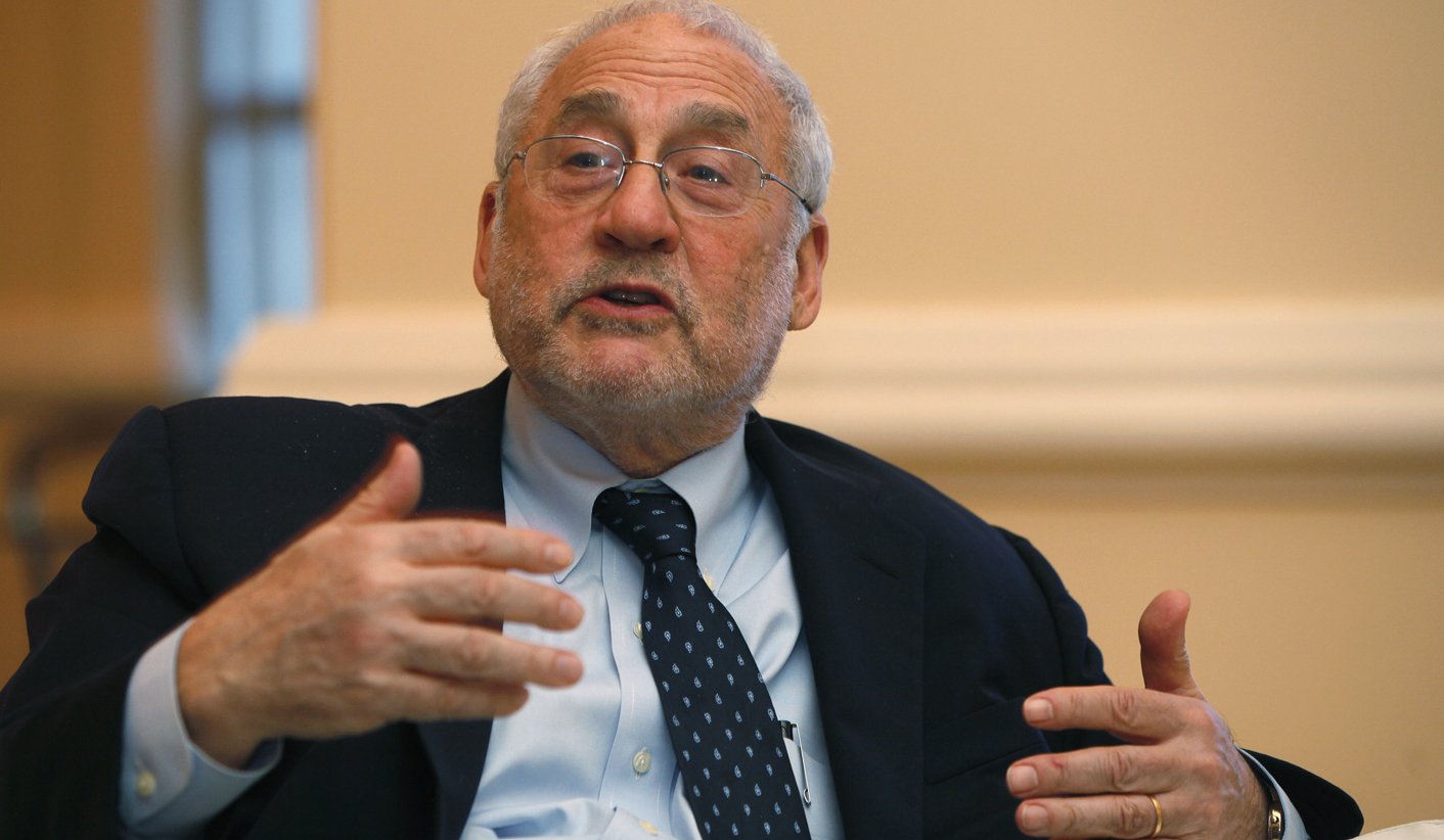 Nobel Laureate in economics and former World Bank chief Joseph Stiglitz speaks to the media after his lecture "The Price of Inequality" at the Center for The New Economy Annual Conference at a hotel in San Juan, February 21, 2014. REUTERS/Ana Martinez (PUERTO RICO - Tags: BUSINESS EDUCATION) - RTX199SV