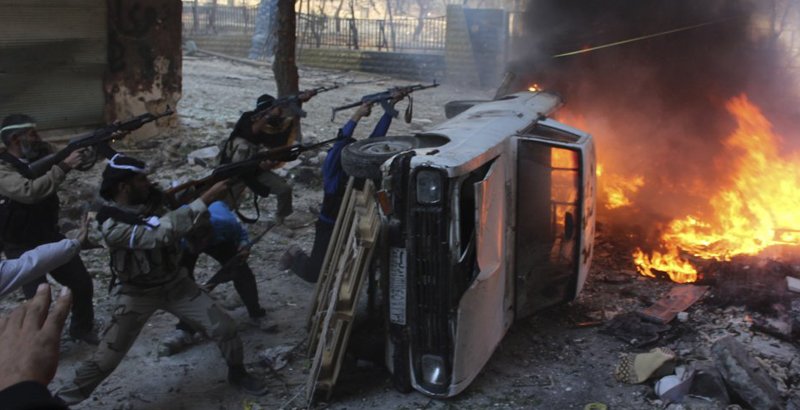 Fig.3 Armed unit take position behind a damaged car.