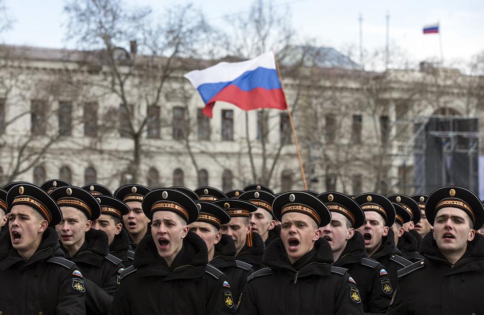 Russian naval forces participate in a festive ceremony marking the first anniversary of the signing of the Treaty for Adoption within the Russian Federation of the Independent Republic of Crimea. Sevastopol, March 18, 2015.