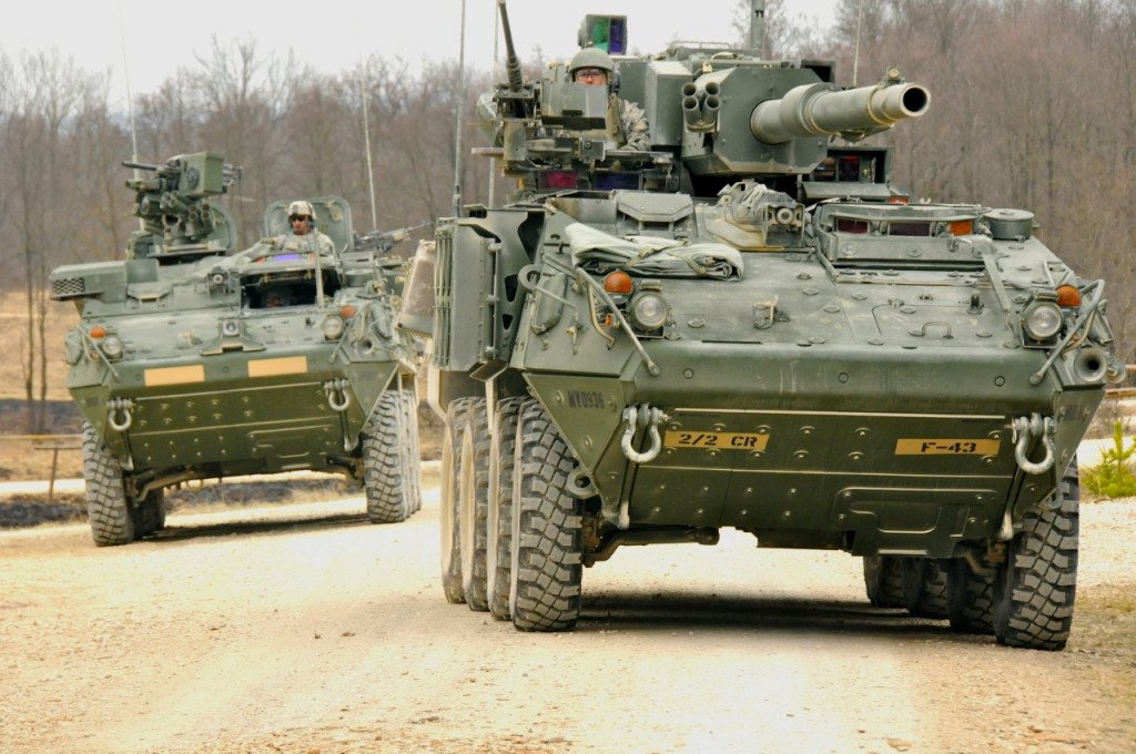 M1128 MGS armed with a 105mm gun accompanies a M1126 Infantry Carrier Vehicle (ICV). 