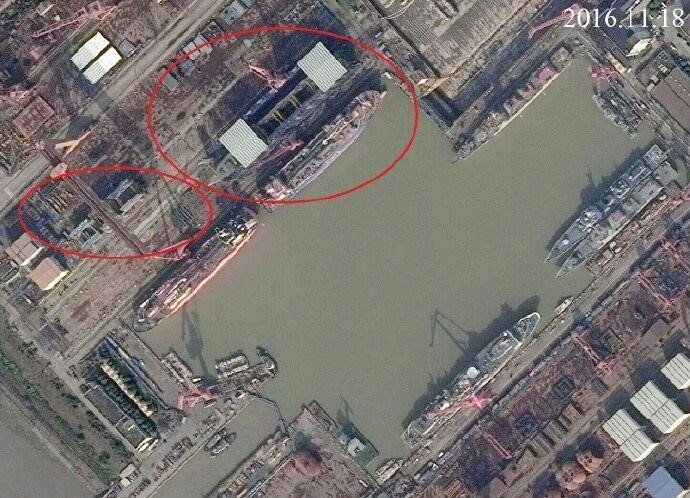 The above satellite image of Jiangnan shipyard dated November 11, 2016 clearly shows that the first Type 55 hull has been completed, while additional hull sections for a second Type 55 are under construction.