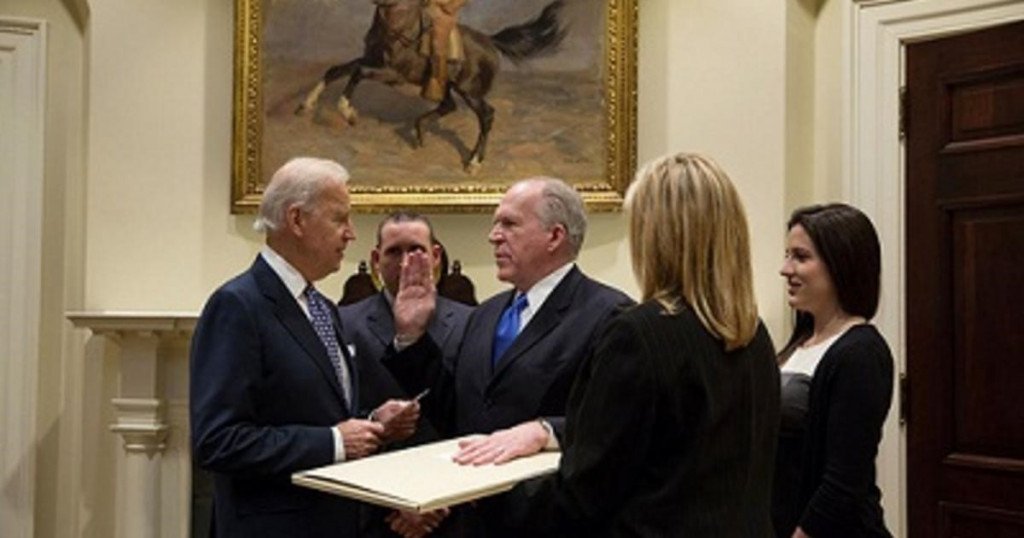 Vice President Joe Biden administering the oath of office to John Brennan on March 8th, 2013. He placed his left hand on an original draft copy of the U.S. Constitution which predated the ratification of the “Bill of Rights”.