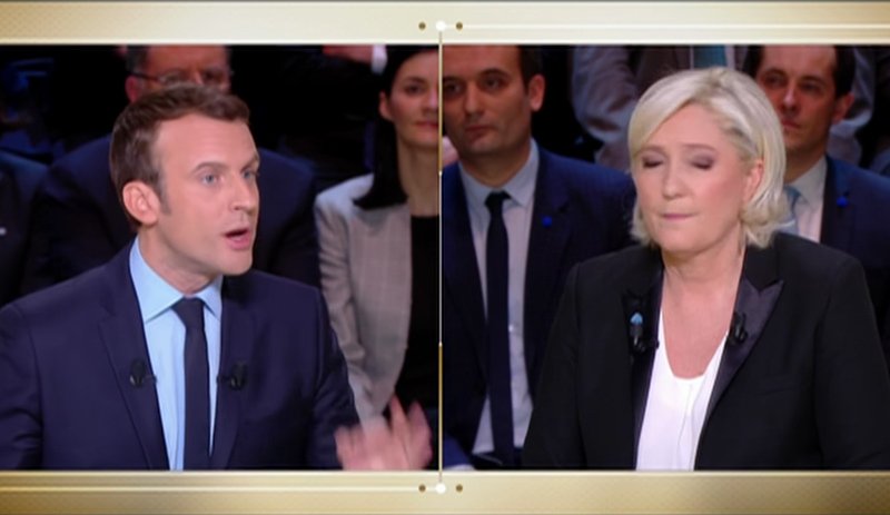 In the current French presidential election campaign, Marin Le Pen (right) is the anti-establishment change candidate and Emmanuel Macron (left) is the pro-establishment status quo candidate. (Image source: LCI video screenshot)