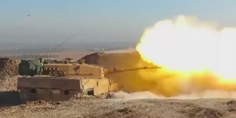 IMAGE: Turkish Leopard 2 main battle tanks is firing at ISIS targets during the battle for al-Bab