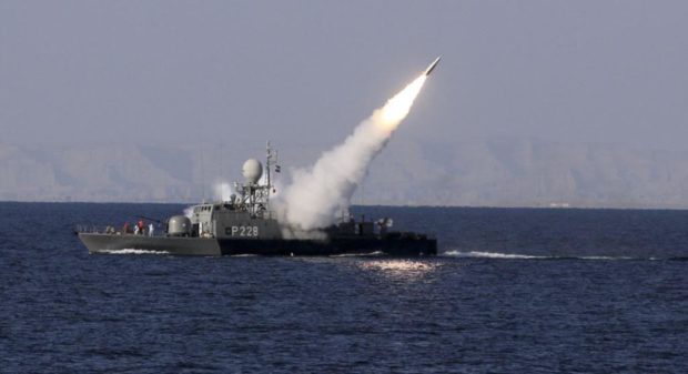 A medium-range missile is test-fired by Iran near the Strait of Hormuz in 2012. (Reuters)