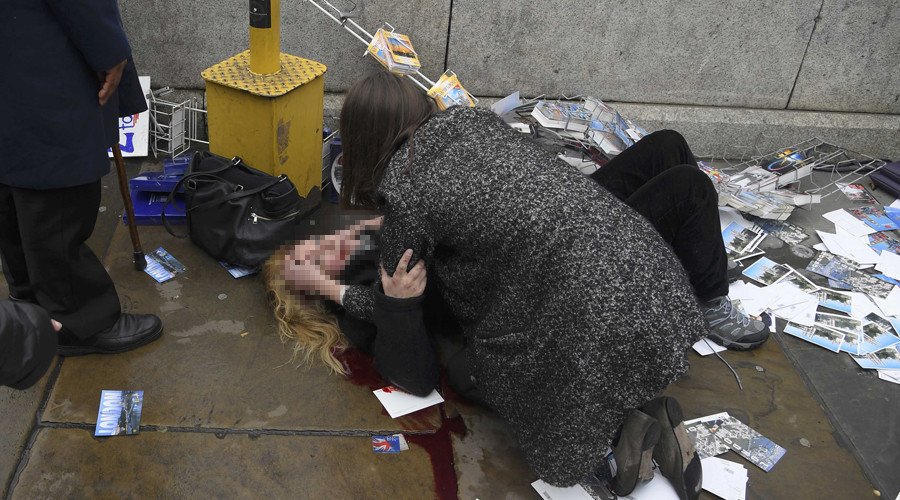 A woman lies injured after a shooting incident on Westminster Bridge in London, March 22, 2017. © Toby Melville / Reuters