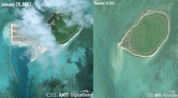 A large area of land reclamation has been added to the west side of the island and developed into a port facility with adjacent above ground buildings and strengthened, underground structures that are most likely munitions storage magazines.