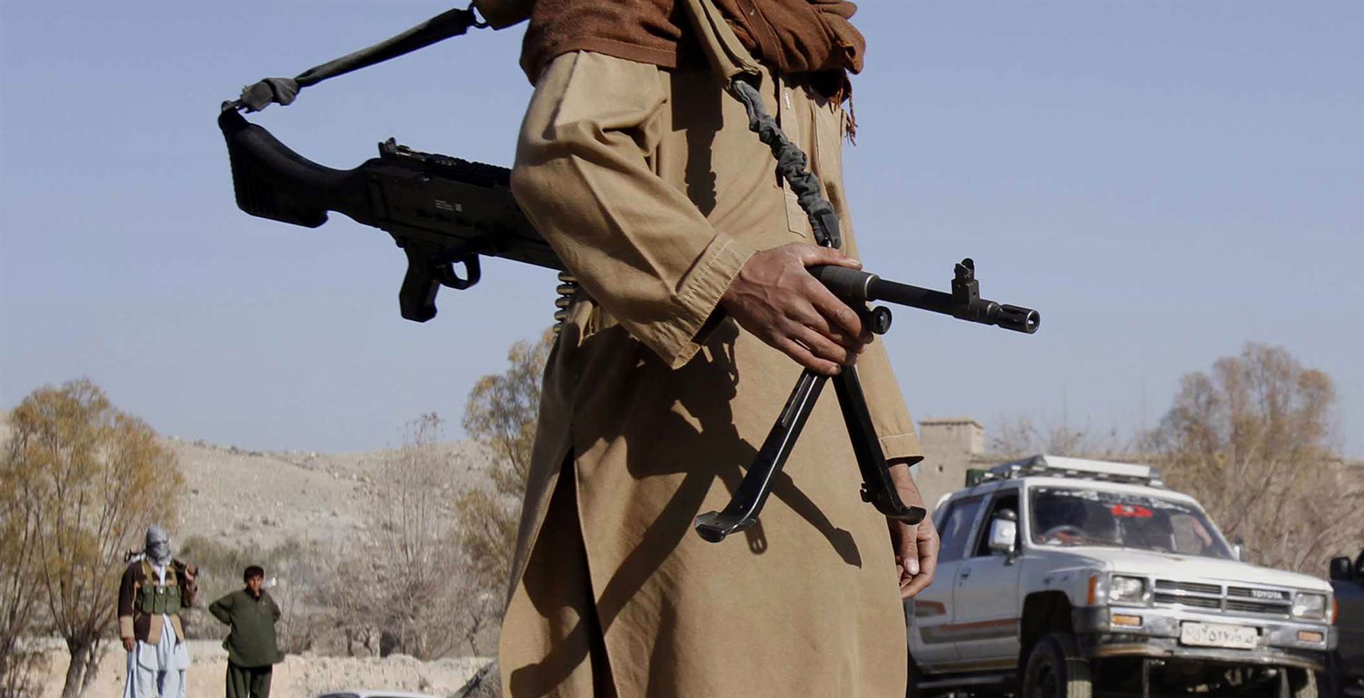A Taliban fighter mans a checkpoint in Nangarhar province, Afghanistan, in 2010. AP file