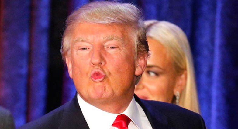 Donald Trump makes a face at his caucus night rally in Des Moines. (REUTERS/Scott Morgan)