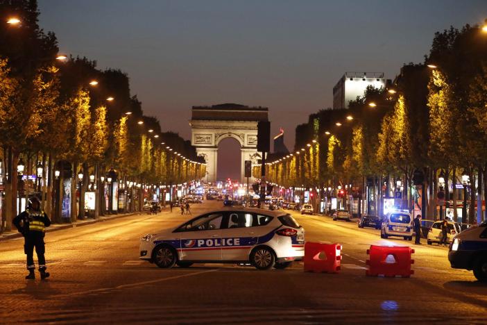 Police secure the Champs Elysee Avenue after one policeman was killed and another wounded in a shooting incident in Paris, France, April 20, 2017. REUTERS/Christian Hartmann