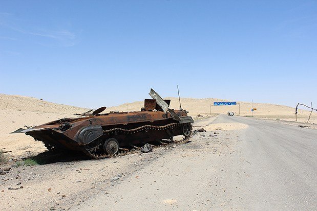 Destroyed ISIS vehicle on the road to Palmyra, Syria (PHOTO: Patrick Henningsen @21WIRE)