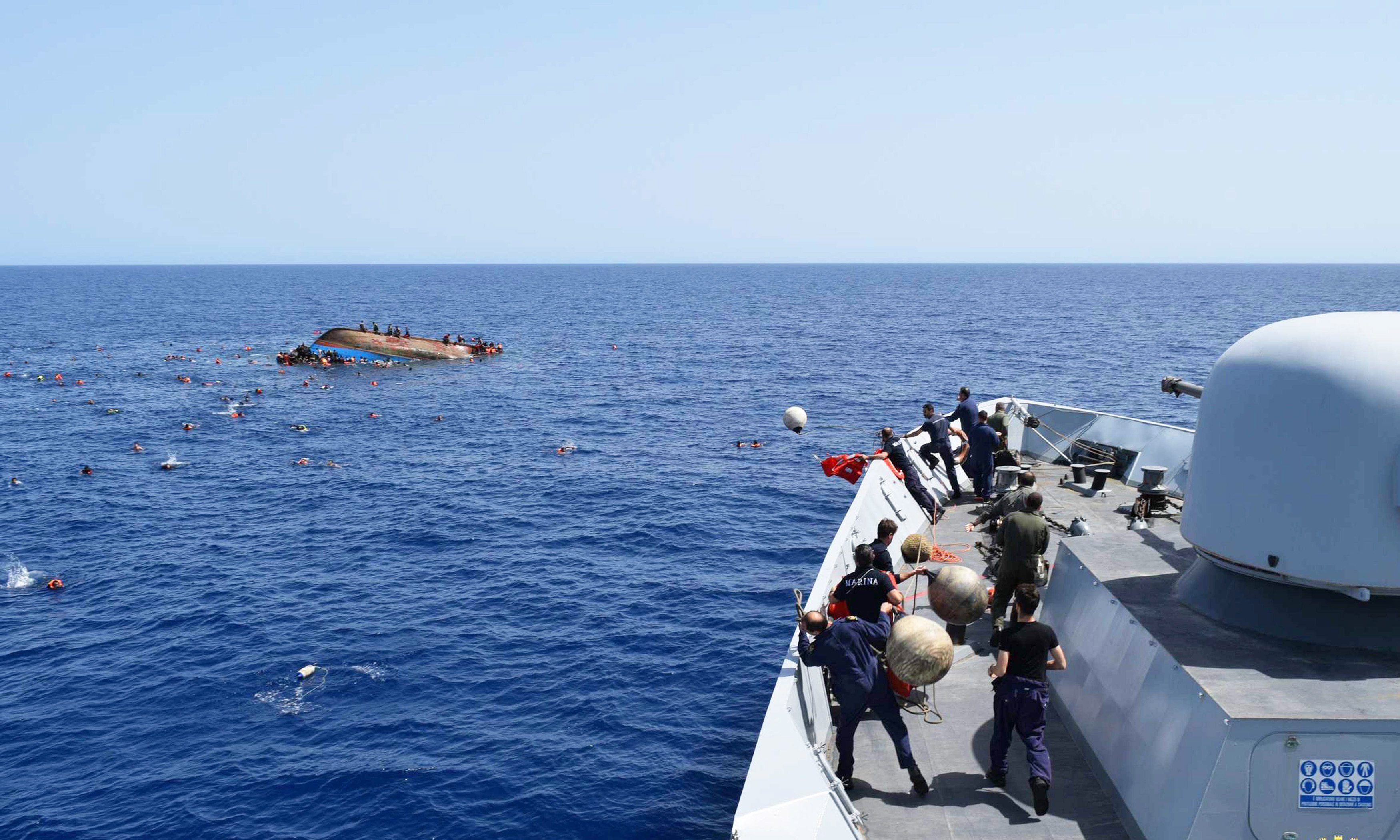 Italian Navy rescuing migrants /Source: AFP